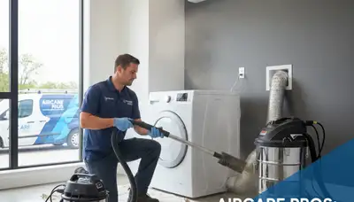 Technician performing professional dryer vent cleaning in Oklahoma City, OK home